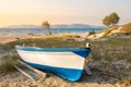 Boat on sandy beach of Marmari