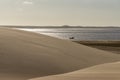 A boat in the sea and dunes - Delta do ParnaÃÂ­ba, LenÃÂ§ois Maranhenses, PiauÃÂ­, Brazil. CearÃÂ¡, Jericoacoara, Barreirinhas, Atins