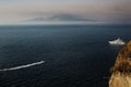 Boat in the sea, mountain on the background of the sea. Sorrento, view over Neapolitan Bay Royalty Free Stock Photo