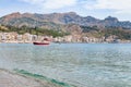 Boat in sea near waterfront of Giardini Naxos Royalty Free Stock Photo