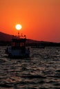 Boat on the sea at sunset.