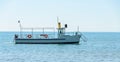 Boat or ship navigating on blue Black Sea water, entertaiment yacht