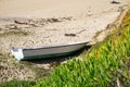 Boat shipwrecked on a beach, California