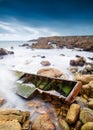 Boat shipwrecked on the coast Royalty Free Stock Photo