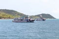 A boat shuttles tourists to Koh Larn, a popular beach in Chon Buri province