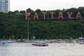 A boat shuttles tourists to Koh Larn, a popular beach in Chon Buri province