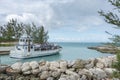 Boat shuttling tourists to Coco Cay Bahamas private tropical is