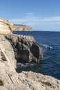 Boat with sightseers returning from Blue grotto on Malta