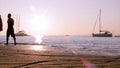 Boat silhoette at sunset in, Ria Formosa. Algarve