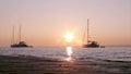 Boat silhoette at sunset in Ria Formosa. Algarve