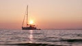 Boat silhoette at sunset in Ria Formosa. Algarve