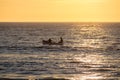 Boat silhouette at beautiful sunset in Mancora Beach - Mancora, Peru