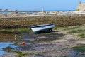 Boat standing on the shore of Point Penmarch, Brittany, France Royalty Free Stock Photo