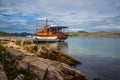 boat stopped and anchored in the calm waters and colorful, Kornati islands, Dalmatia, Croatia/ boat / boats / Islands / G Royalty Free Stock Photo