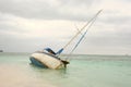 Boat stranded on the beach Royalty Free Stock Photo