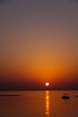 Boat , sunset at beach in Cyprus Royalty Free Stock Photo