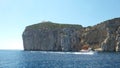 Boat in front of a mountain