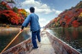 Boat taxi service in arashiyama river with autumn background