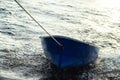 Boat is tethered behind fishing schooner