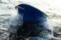 Boat is tethered behind fishing schooner