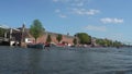 Boat tour on Amstel River with famous bridge called Magere Brug - AMSTERDAM - THE NETHERLANDS - JULY 19, 2017 Royalty Free Stock Photo