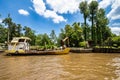 Boat tour on the Parana Delta, Tigre, Buenos Aires, Argentina. Palm trees, construction site of modern brick house