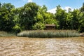 Boat tour on the Parana Delta, Tigre, Buenos Aires, Argentina. Palm trees, construction site of modern brick house