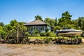 Boat tour on the Parana Delta, Tigre, Buenos Aires, Argentina. Palm trees, construction site of modern brick house