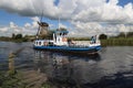 Boat with tourists in Kinderdijk in Holland Royalty Free Stock Photo