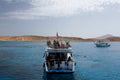 Boat with tourists near the Tiran Island