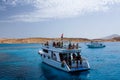 Boat with tourists near the Tiran Island