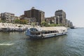 boat with tourists on a river walk sails along the Nile River in the center of Cairo among the skyscrapers and attractions Royalty Free Stock Photo