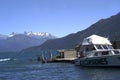 boat for tourists sailing on lake puelo in the province of chubut in the background the cordillera de los andes