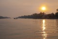 Boats on Mekong River in Vietnam at sunset Royalty Free Stock Photo