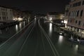 Boat Trail of Lights in Grand Canal, Rialto Bridge, Ponte Degli Scalzi, Venice Royalty Free Stock Photo