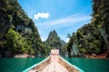 Boat traveling through great canyon or islands in Thailand. Asia tropical tourism concept