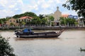 A boat travels down the Mekong river in Ben Tre, Viet Nam Royalty Free Stock Photo