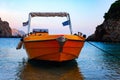 Boat trip along a river in Corfu Greece. Ship on clean blue water. Island houses on the shore view. Greek beautiful