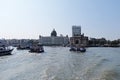 Taj Mahal hotel, Gateway of India and tourist boats in water of Arabian Sea in Mumbai Royalty Free Stock Photo