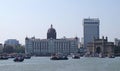 Taj Mahal hotel, Gateway of India and tourist boats in water of Arabian Sea in Mumbai