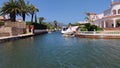 Boat trip from passenger\'s eyes view through the famous canals of Empuriabrava in Catalonia, Spain