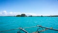 Boat trip on a traditional caledonian sailing boat in Upi bay. typical rocks in the turquoise sea