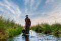 Boat trip in a traditional Makoro at the Okavango Delta, Botswana