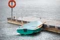 Boat under the summer rain Royalty Free Stock Photo