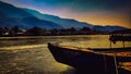 Boat under water and amazing sunrise