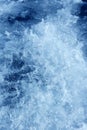 Boat wake foam water propeller blue wash Royalty Free Stock Photo