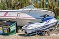 Boat and waverunner laying on the side of the road after Hurricane Ian Fort Myers FL