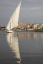 A boat with a white sail. Royalty Free Stock Photo