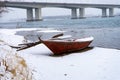 A boat on the winter coast.