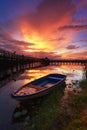 Boat and wooden bridge with beautiful sky. Royalty Free Stock Photo
